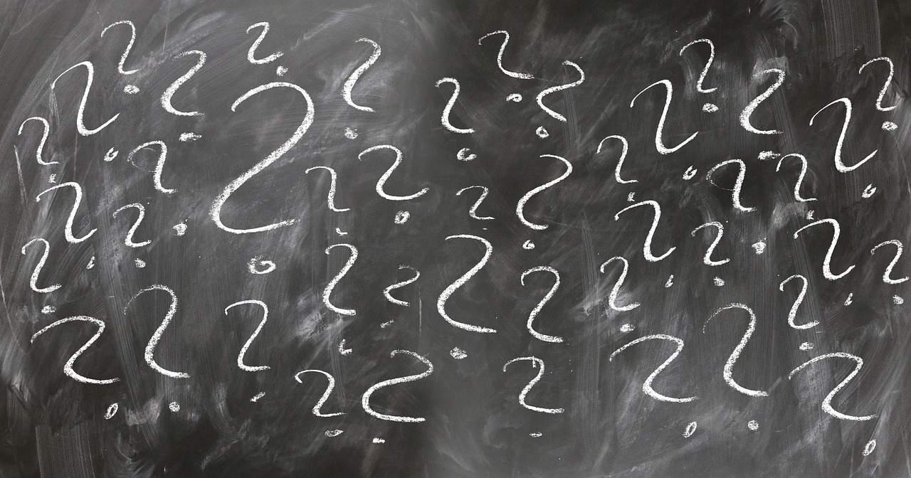 Illustration of a business owner exploring FAQs about website performance, local SEO, and Google Business Profile management